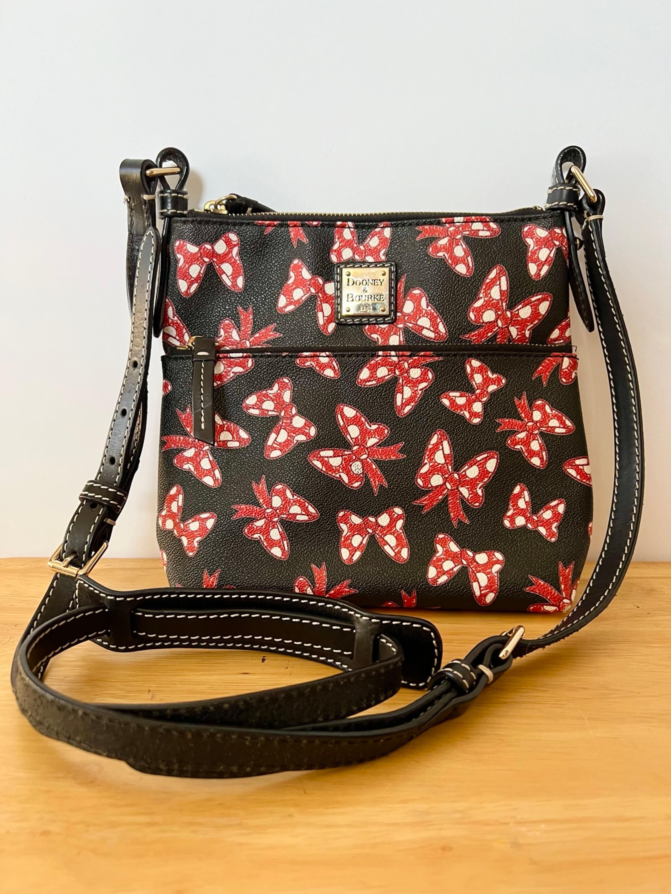 Disney Dooney and Bourke black bows crossbody purse