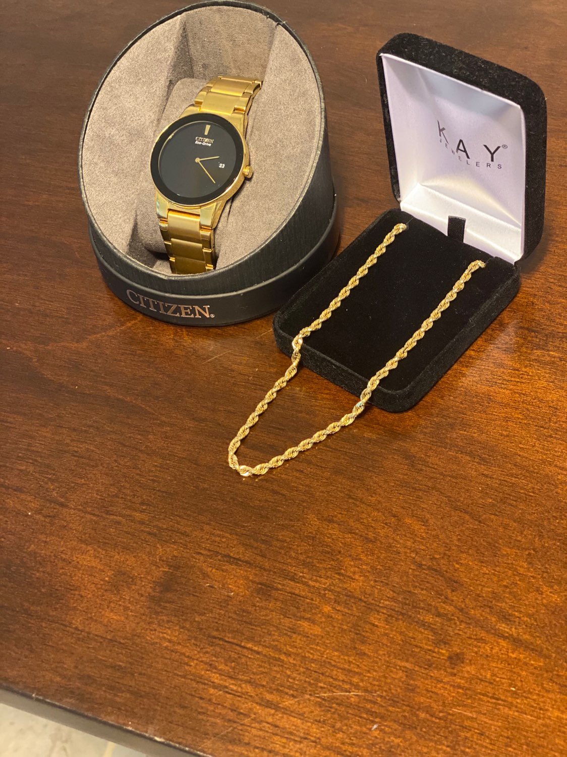 24 gold rope chain and citizen axiom ec