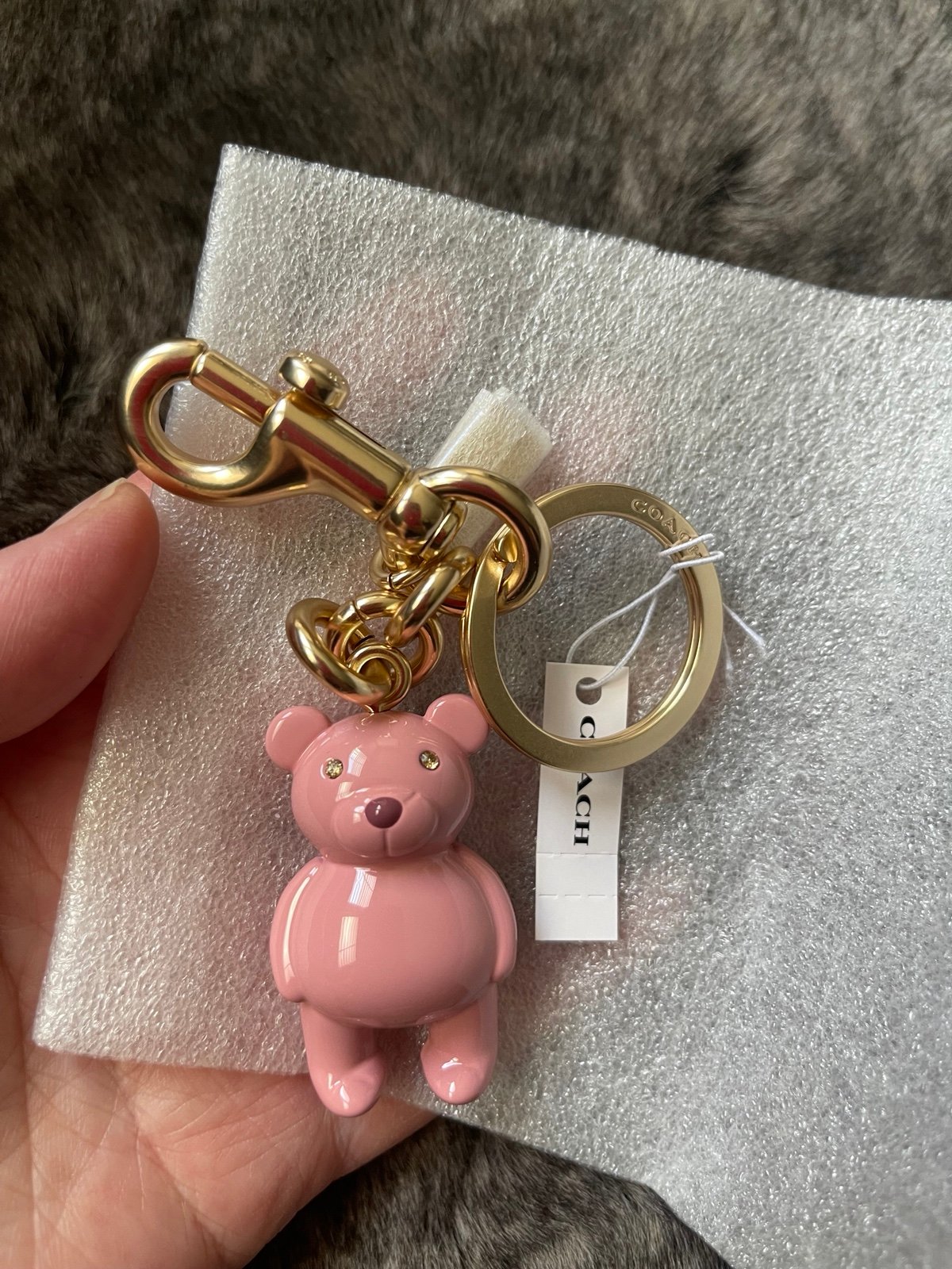 Coach bear bag charm in pink