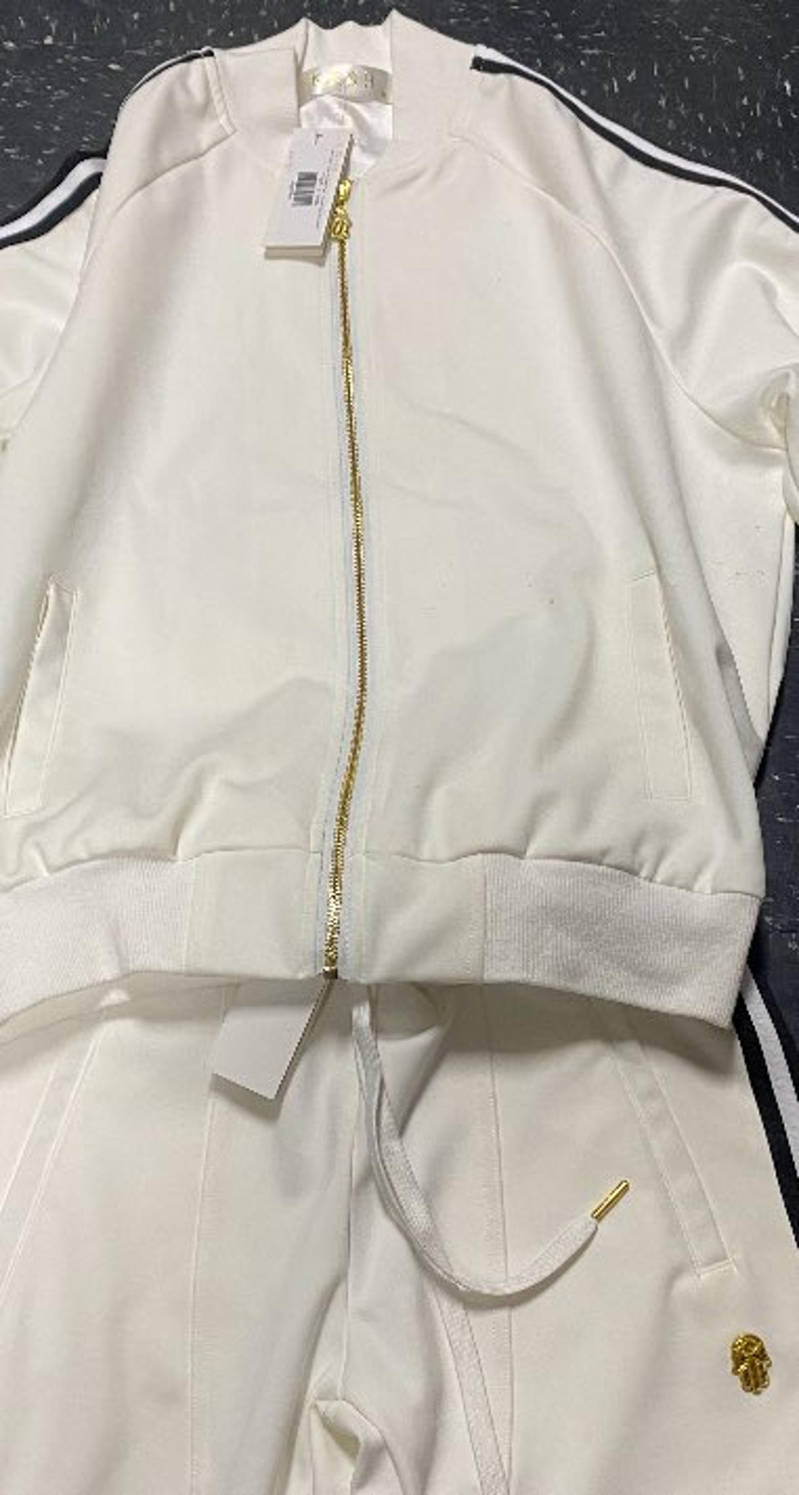 Kash brand track suit