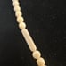 Carved Bovine Bone Necklace