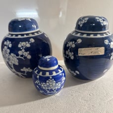 Three blue and white porcelain jars with lids