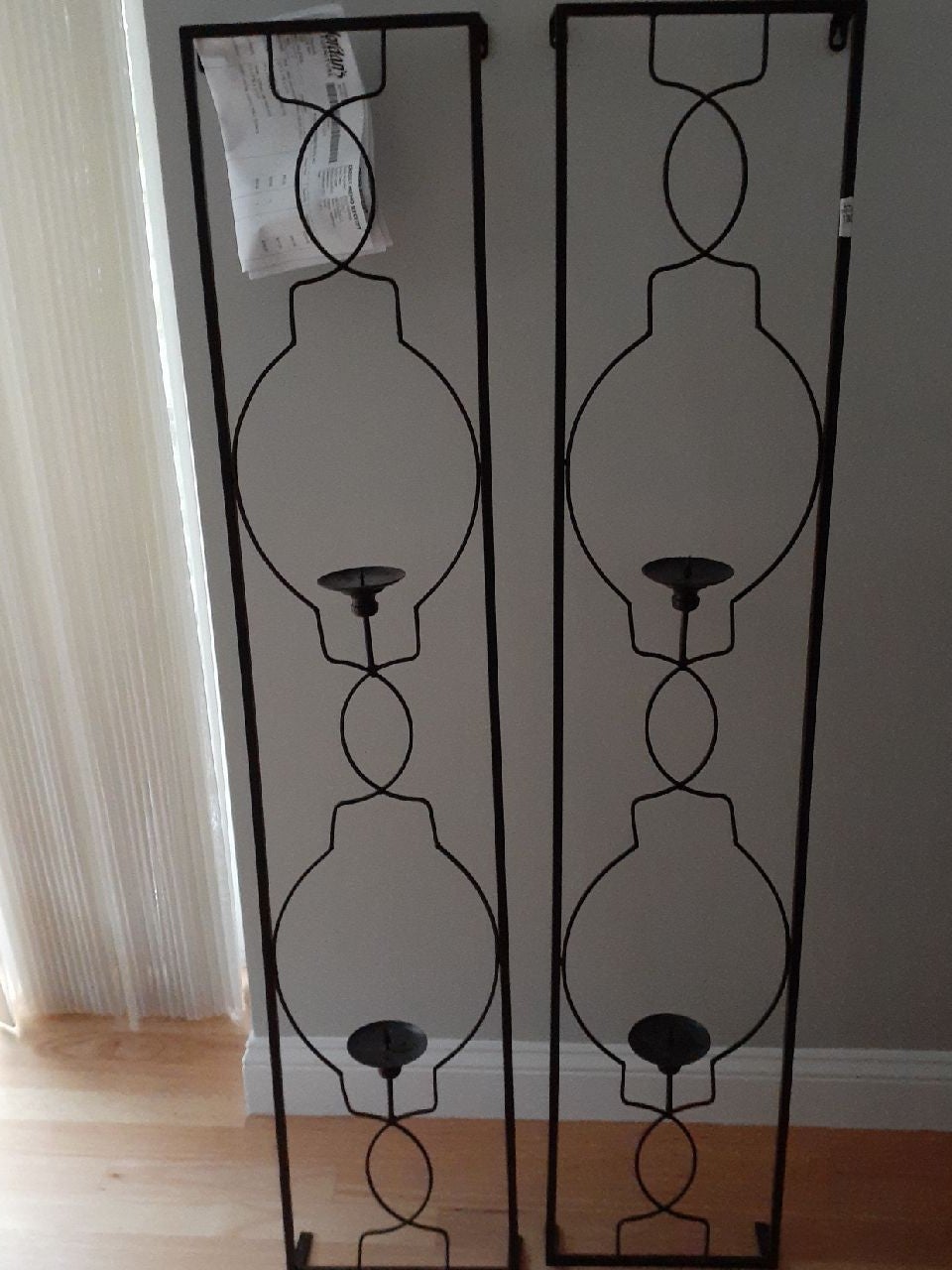 2 candle holding wall scones