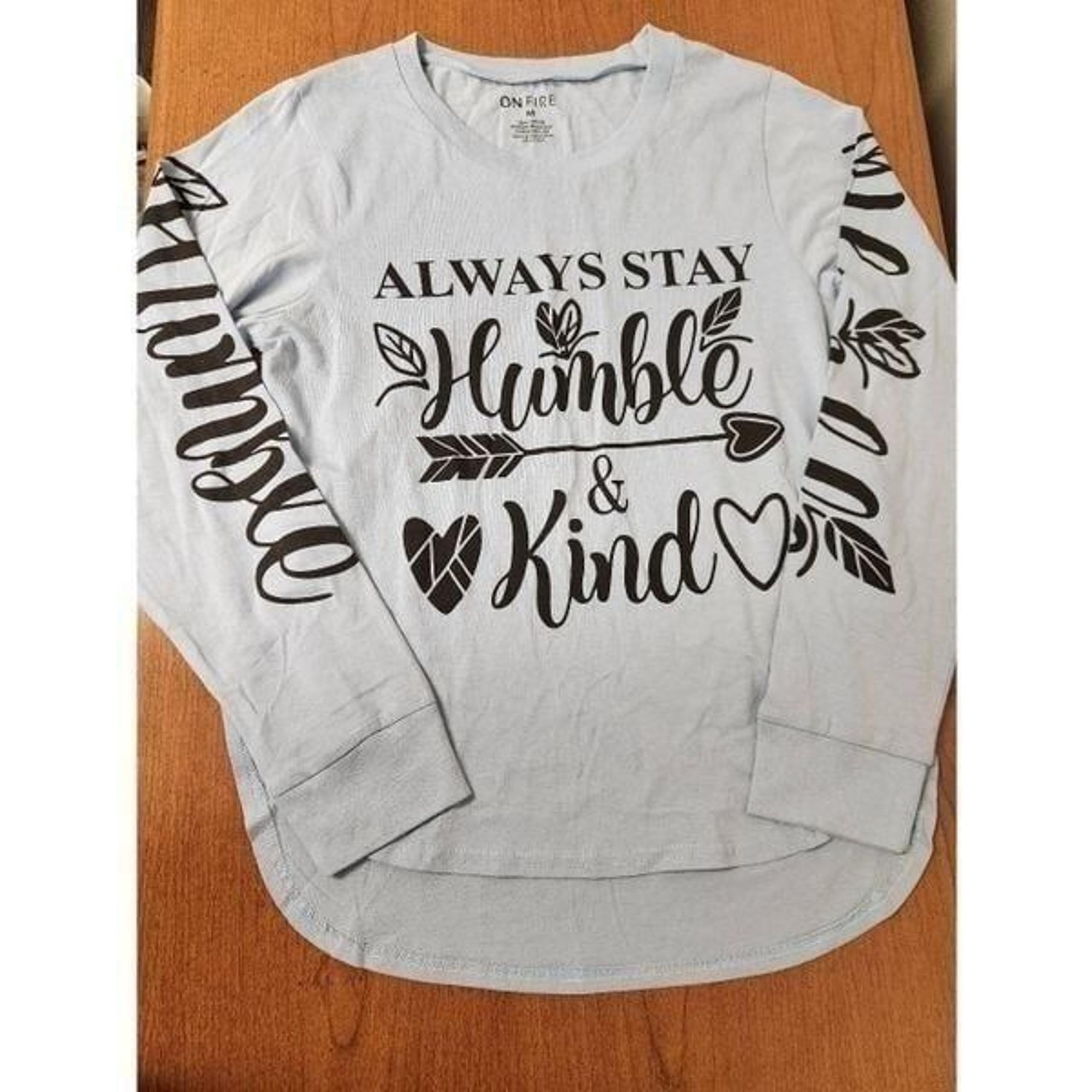 NWT On Fire Medium blue long sleeved t-shirt with "Always stay humble and kin" o