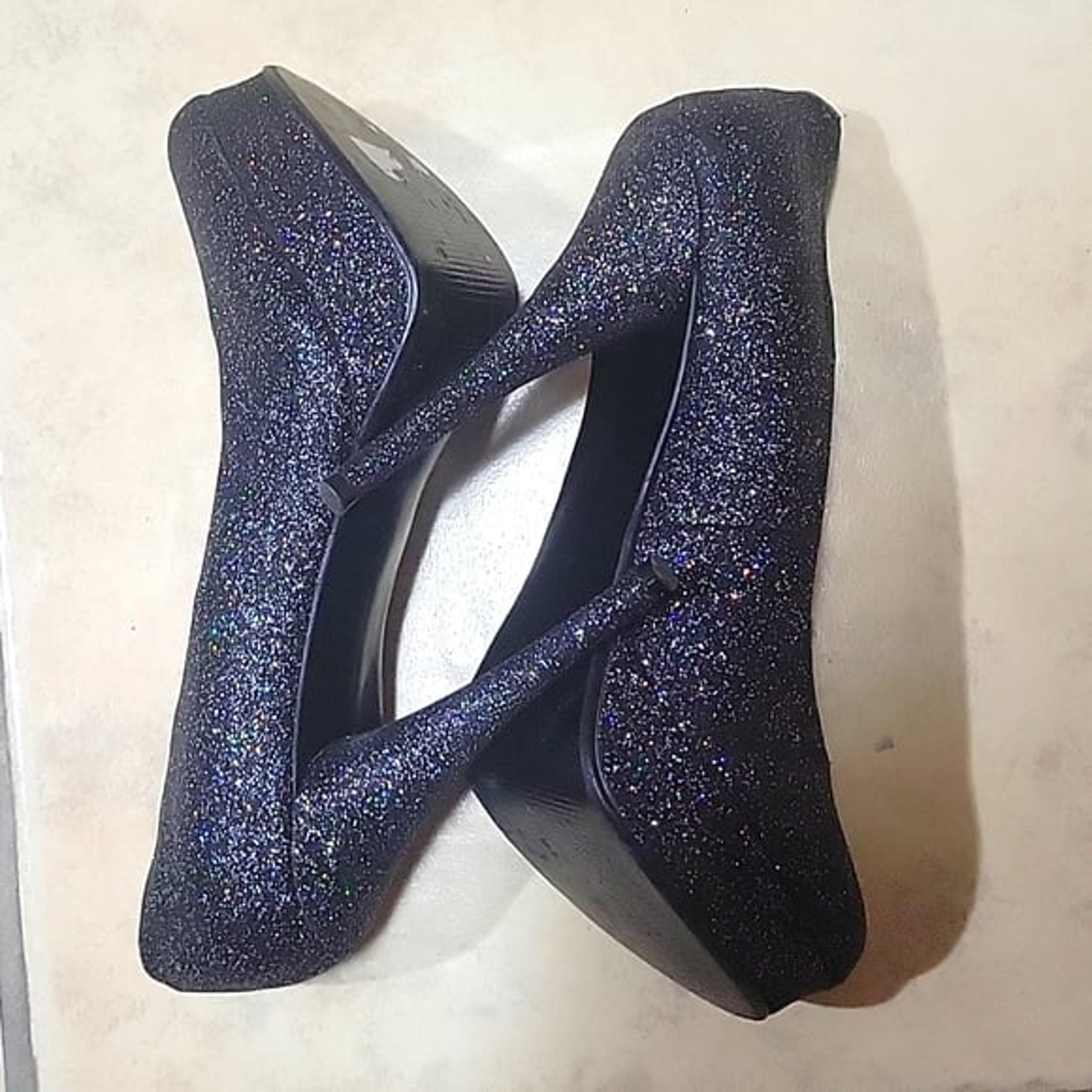 Heels platform. Black glitter sparkle. Also in gray.