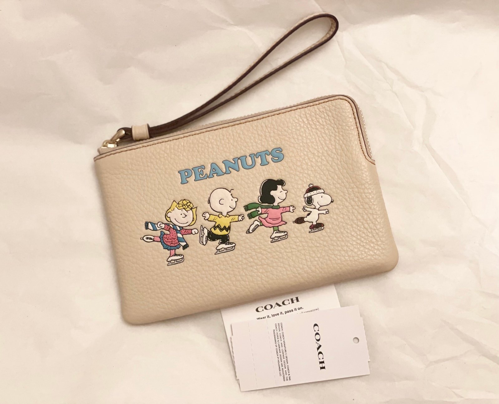 Coach X Peanuts Corner Zip Wristlet With Snoopy And Friends Motif