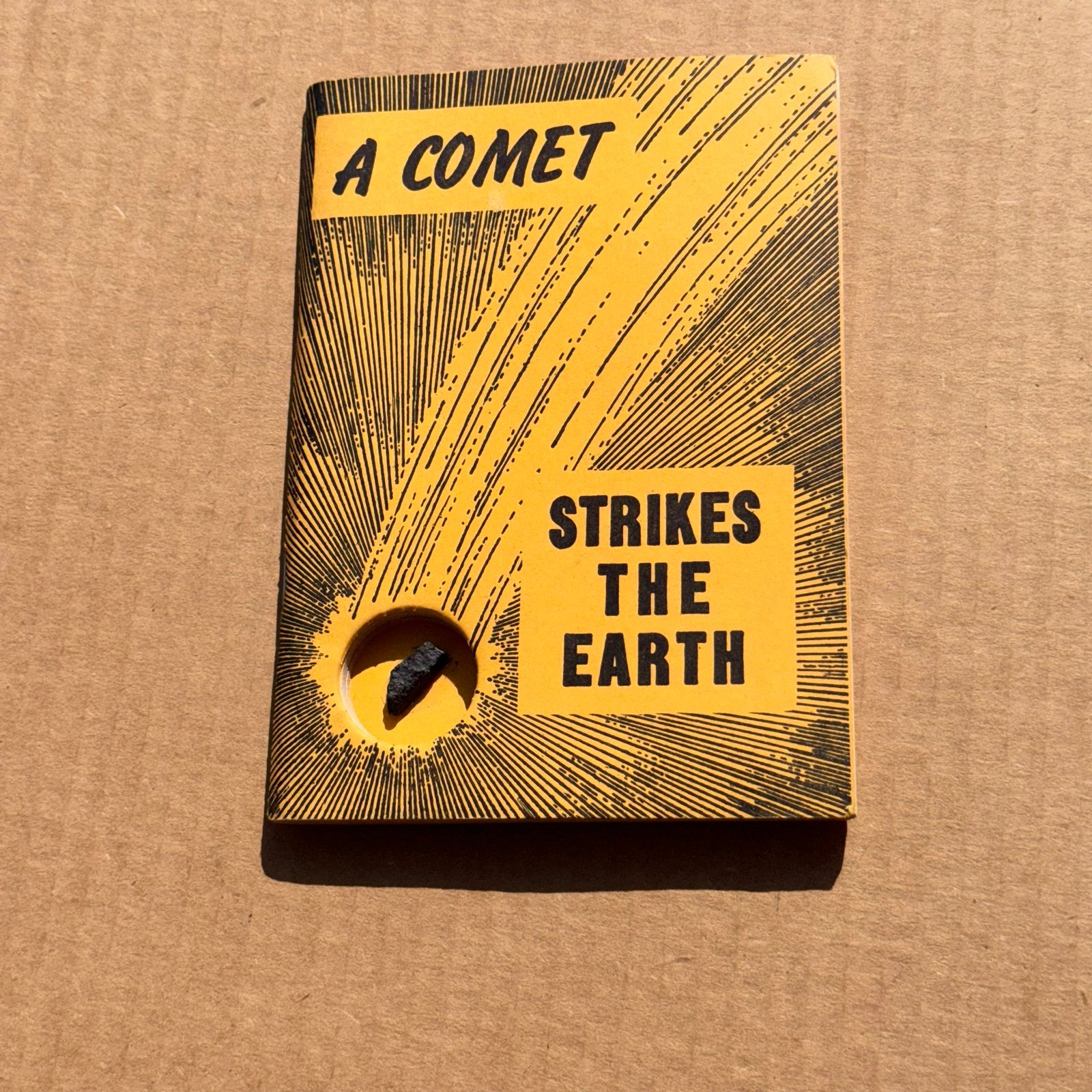 A COMET STRIKES THE EARTH SIGNED H. H. NININGER