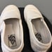 White Slip-On Vans • Women 7.5