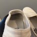 White Slip-On Vans • Women 7.5