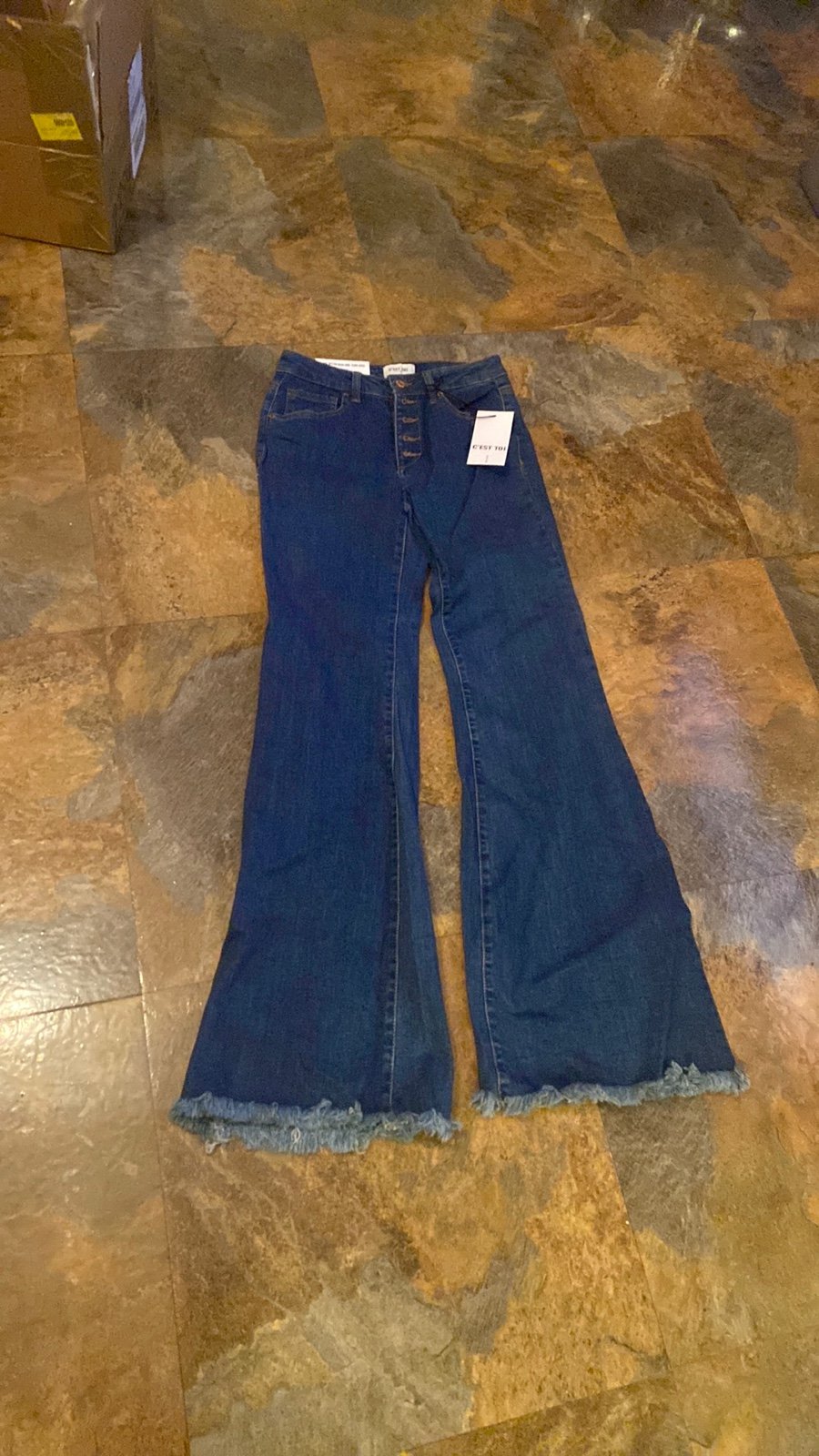C’est Toi brand ladies mid rise button down jeans.