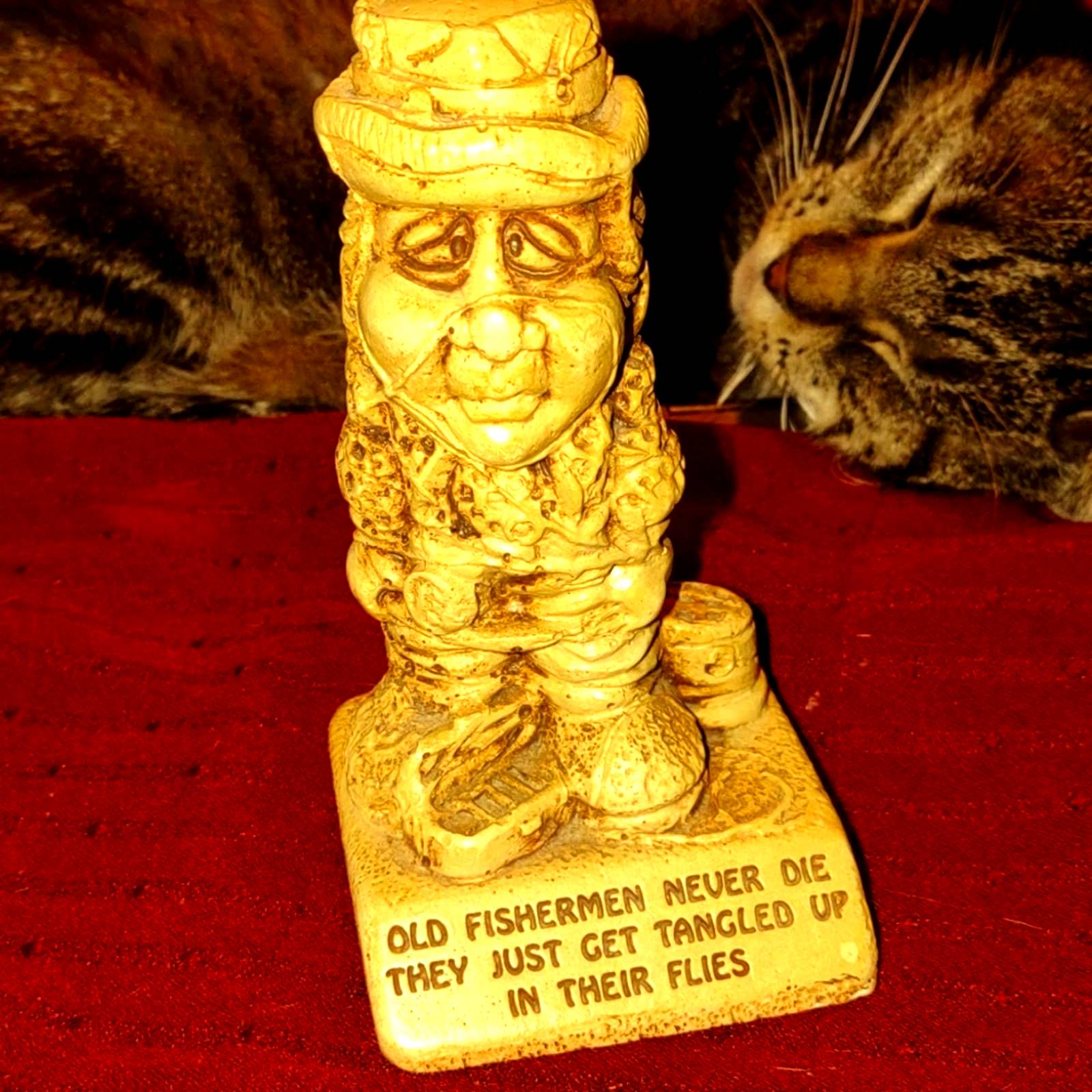 1988 statue by Paula~old fisherman never die~just get tangled up in their flies
