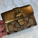 Coach Signature Buckle Monogrammed Canvas & Metallic Gold Leather Trifold Wallet