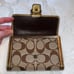 Coach Signature Buckle Monogrammed Canvas & Metallic Gold Leather Trifold Wallet