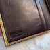 Coach Signature Buckle Monogrammed Canvas & Metallic Gold Leather Trifold Wallet