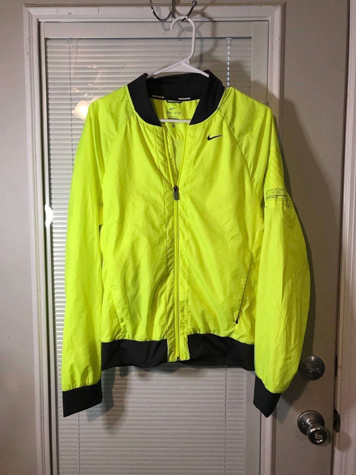 Neon yellow top nike running jacket