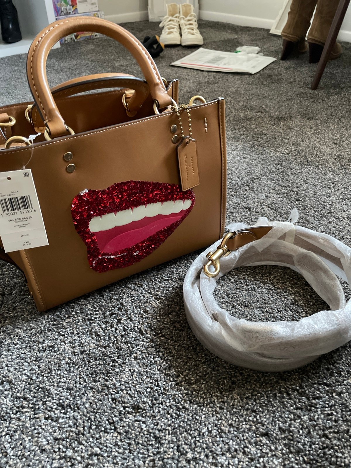 Coach rouge 25