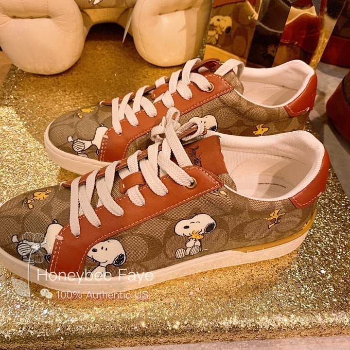 Coach X Peanuts women size 8.5 Clip Low Top Sneaker In With Snoopy
