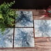 Ceramic coasters have high gloss resin, 4 piece Blue, silver, and white