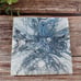 Ceramic coasters have high gloss resin, 4 piece Blue, silver, and white