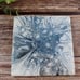 Ceramic coasters have high gloss resin, 4 piece Blue, silver, and white