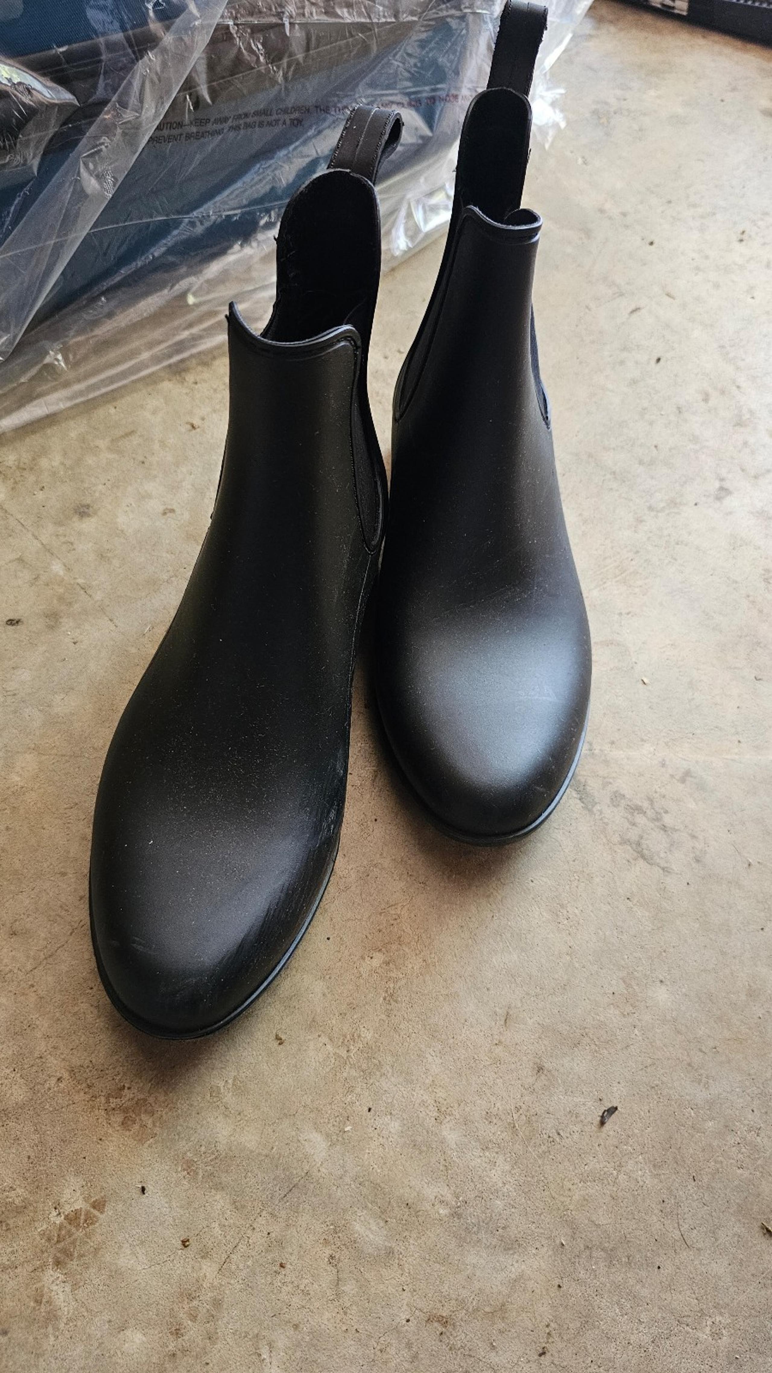 Black rain boots