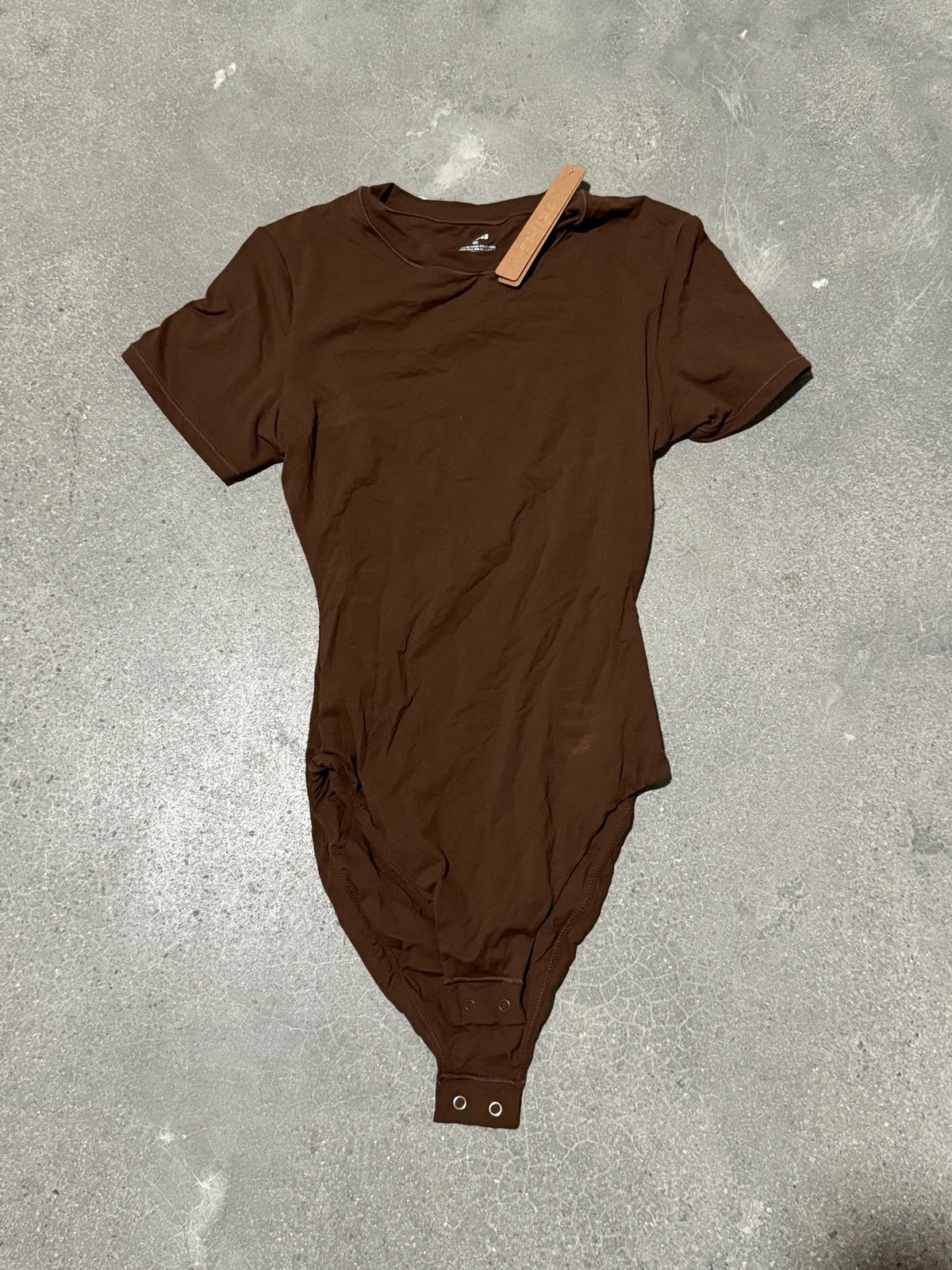 brown SKIMS bodysuit