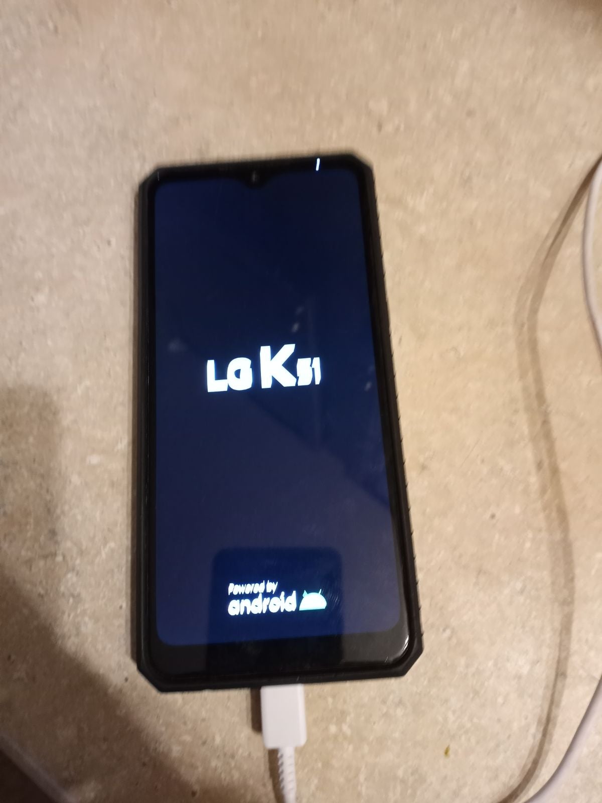 Lg k51 phone with 2 cases