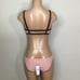 New. Pilyq blush/pink, brown, mint bikini. D-cup top/ S-bottom. Normally 168