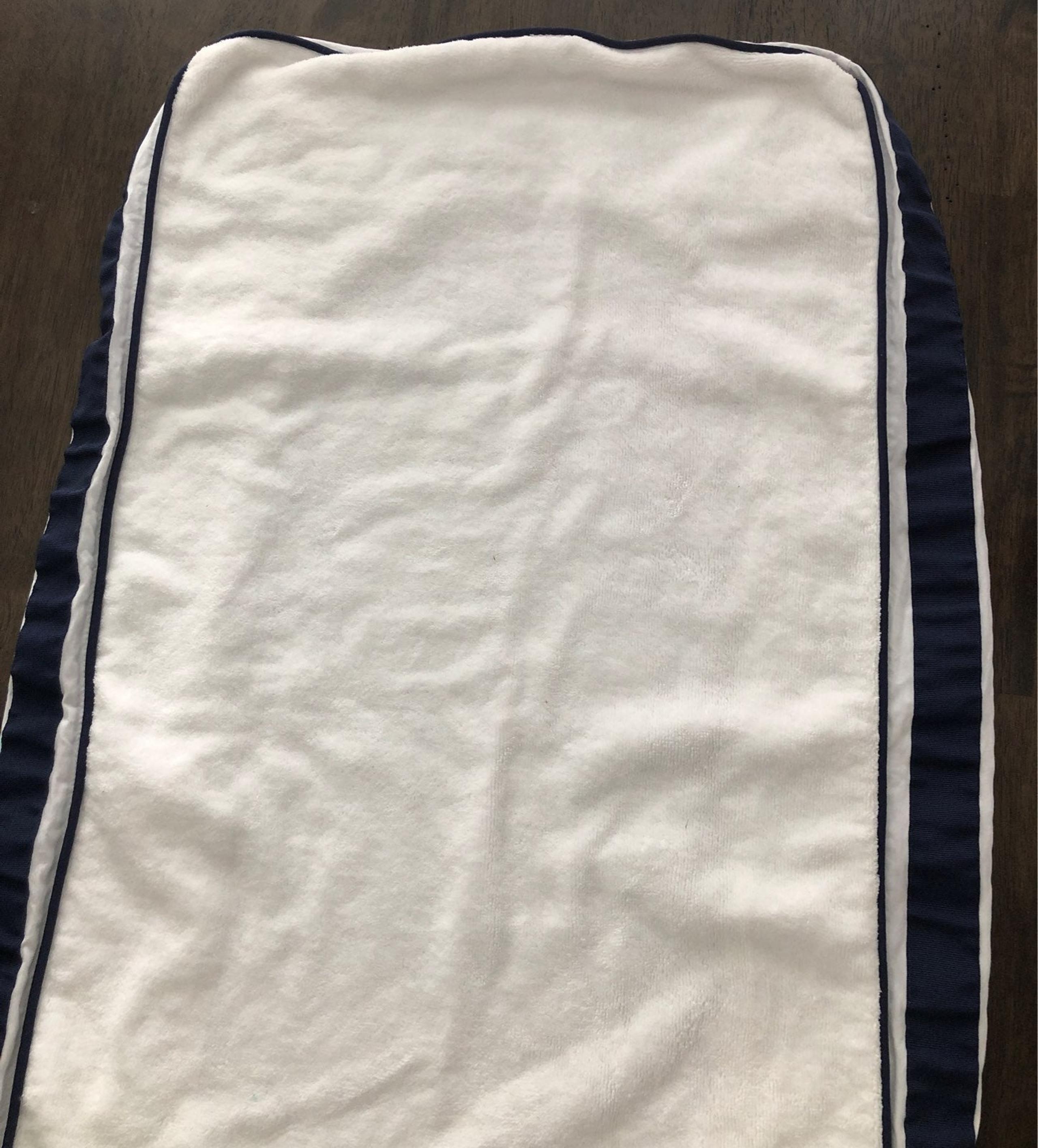 Blue and white Pottery Barn Kids changing pad cover