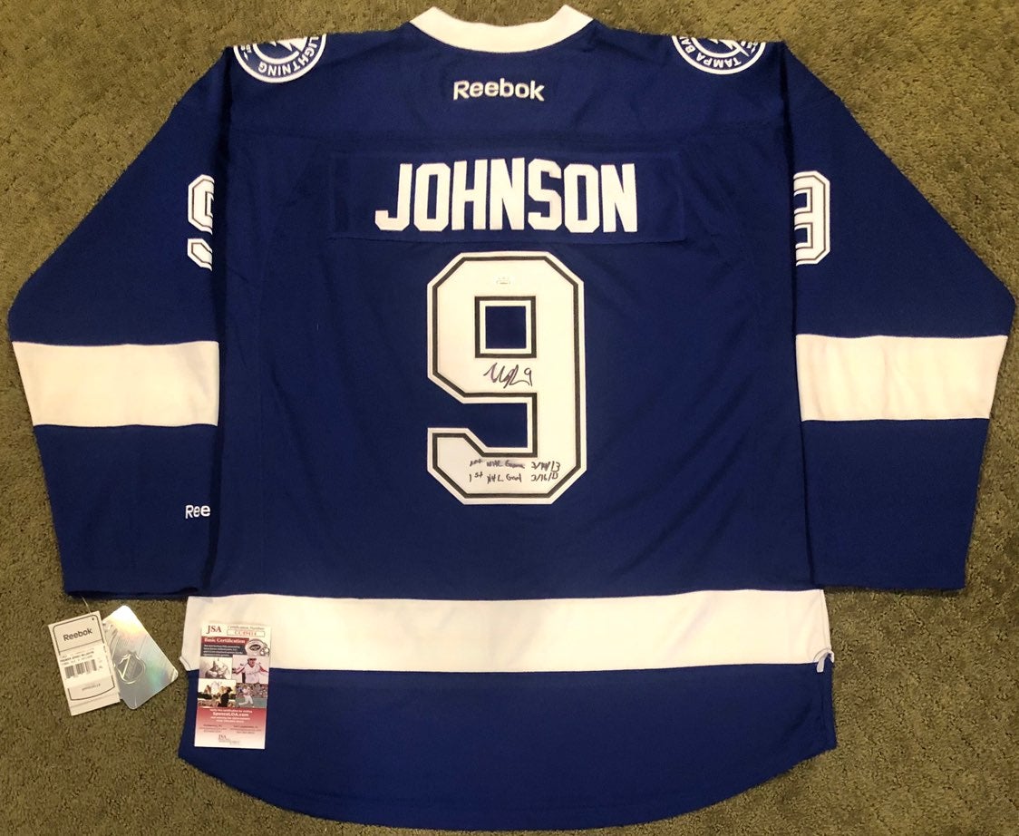 TJ JERSEY & 3 PUCKS GO BOLTS