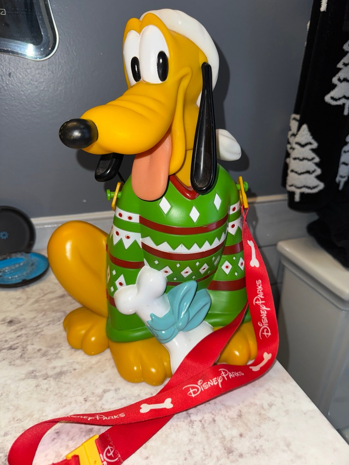 Disney park’s Christmas Pluto popcorn bucket