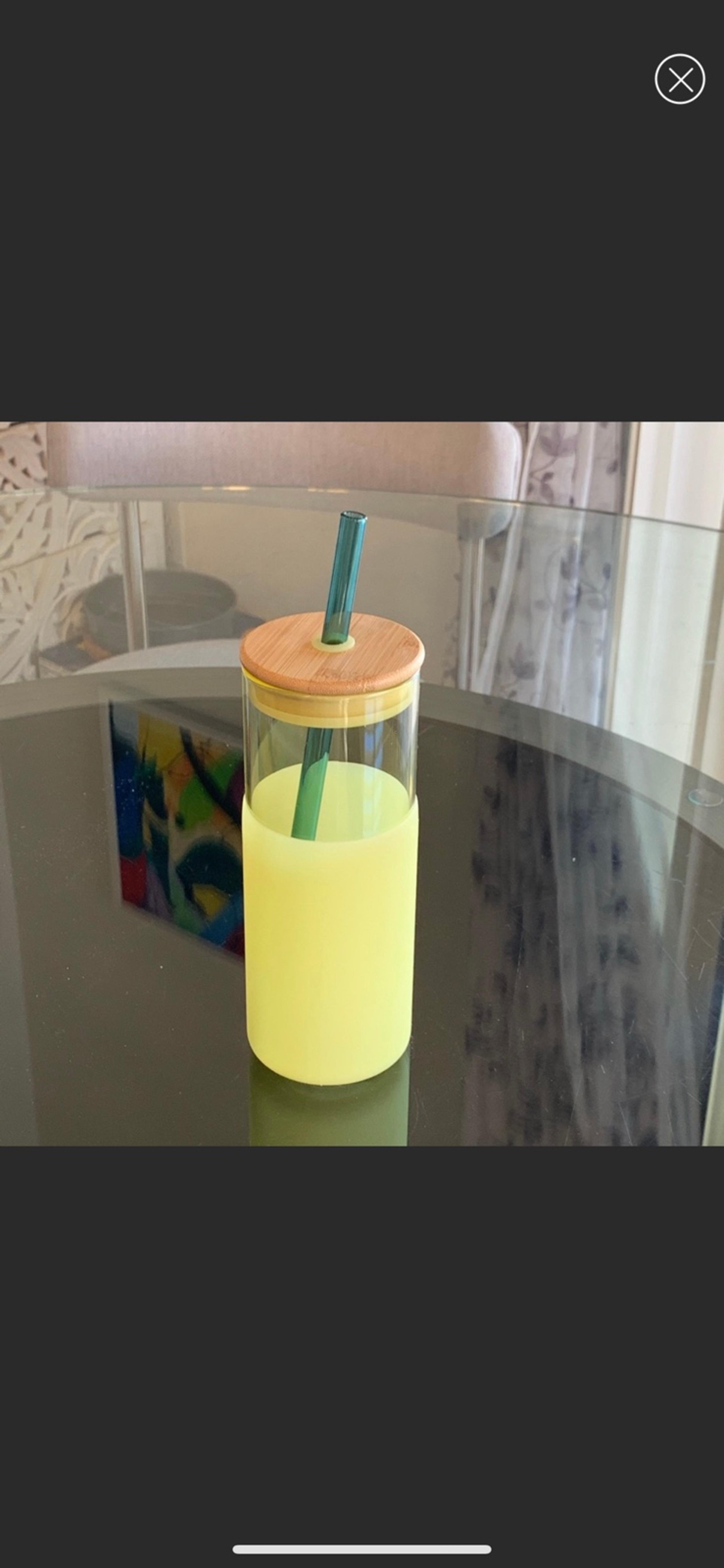 Anthropologie glass bottle with wood lid