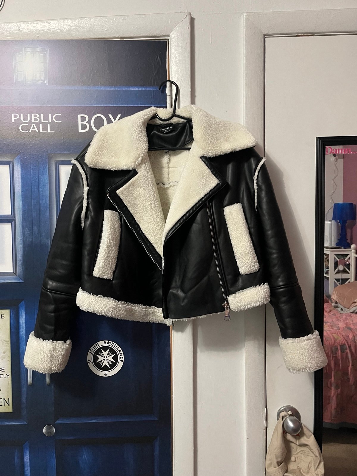 Fleece lined black faux leather coat