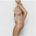 SKIMS Seamless Sculpting Mid Waist Nude Thong Shapewear