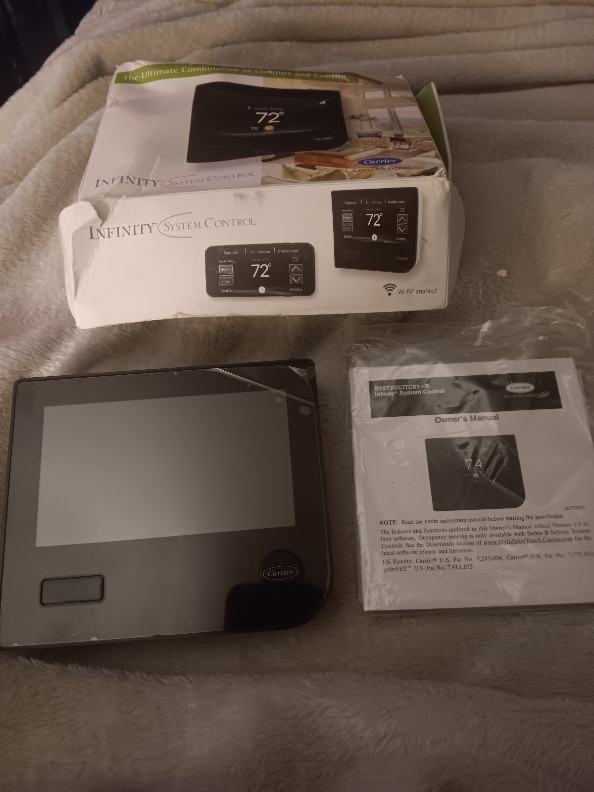 The Carrier Infinity SYSTXCCITC01-B TOUCH SCREEN PROGRAMMABLE WIFI THERMOSTAT