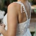 A line princess wedding dress with tulle and pearls and sequined flowers