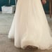 A line princess wedding dress with tulle and pearls and sequined flowers