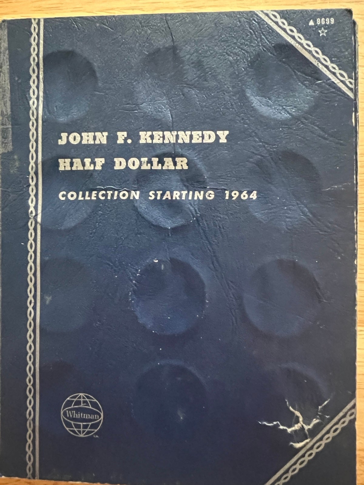 (9) Kennedy Half Dollars With Coin Book