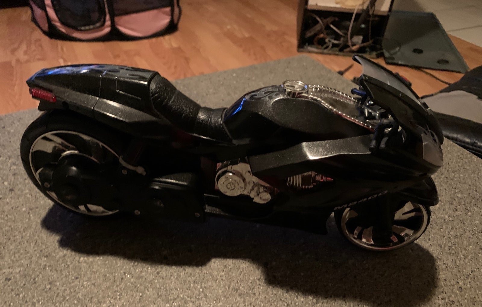 1995 Black Electronic BatDude Motorcycle M2400. Measures: 14”L x 7”H.