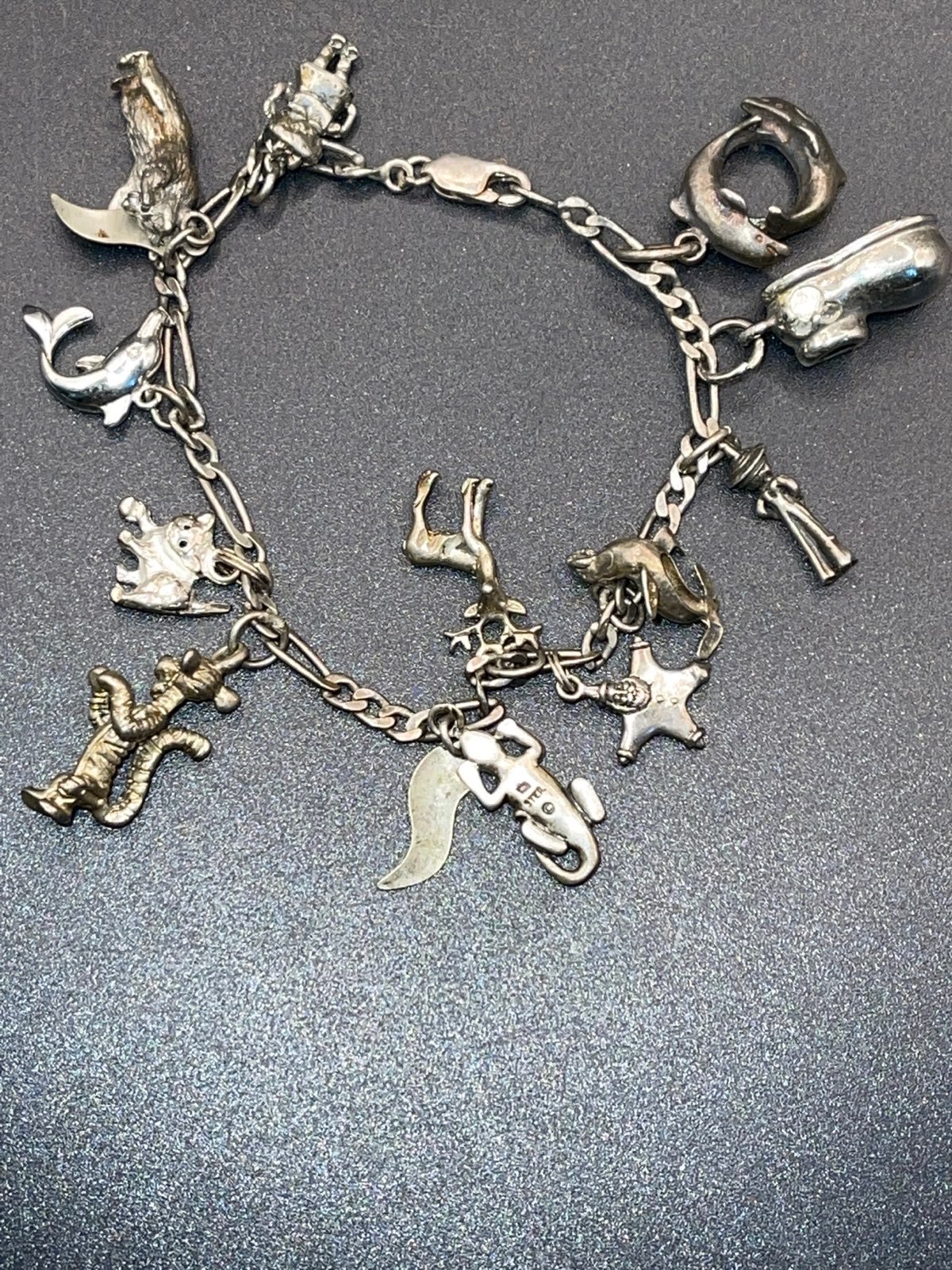 Sterling silver bracelet with charms Disney and others 111721@
