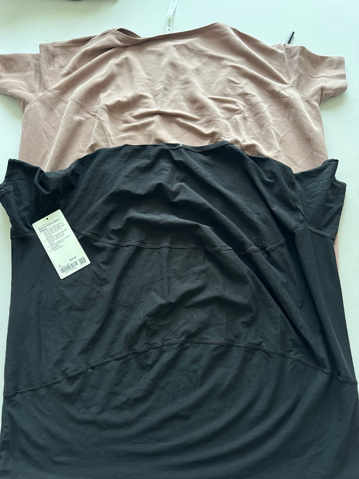 Lululemon Tops- Back in action size: 12