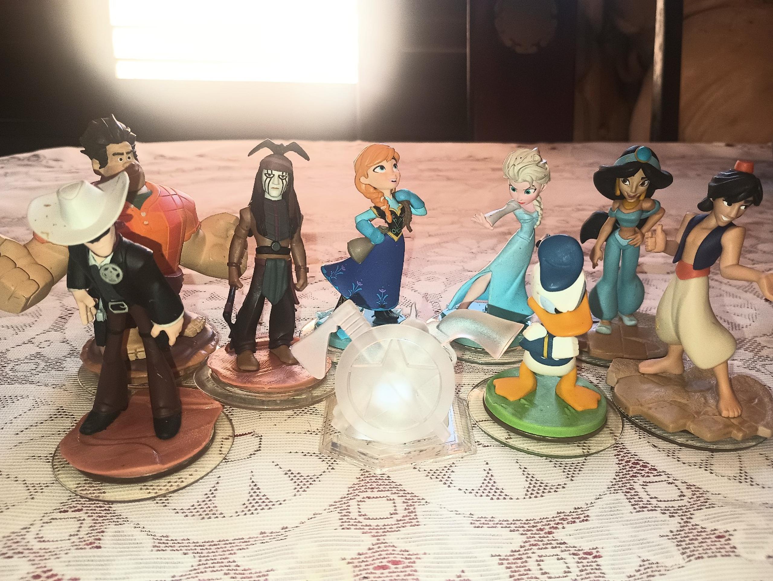 Disney Infinity 8 figures. And playset crystal.
