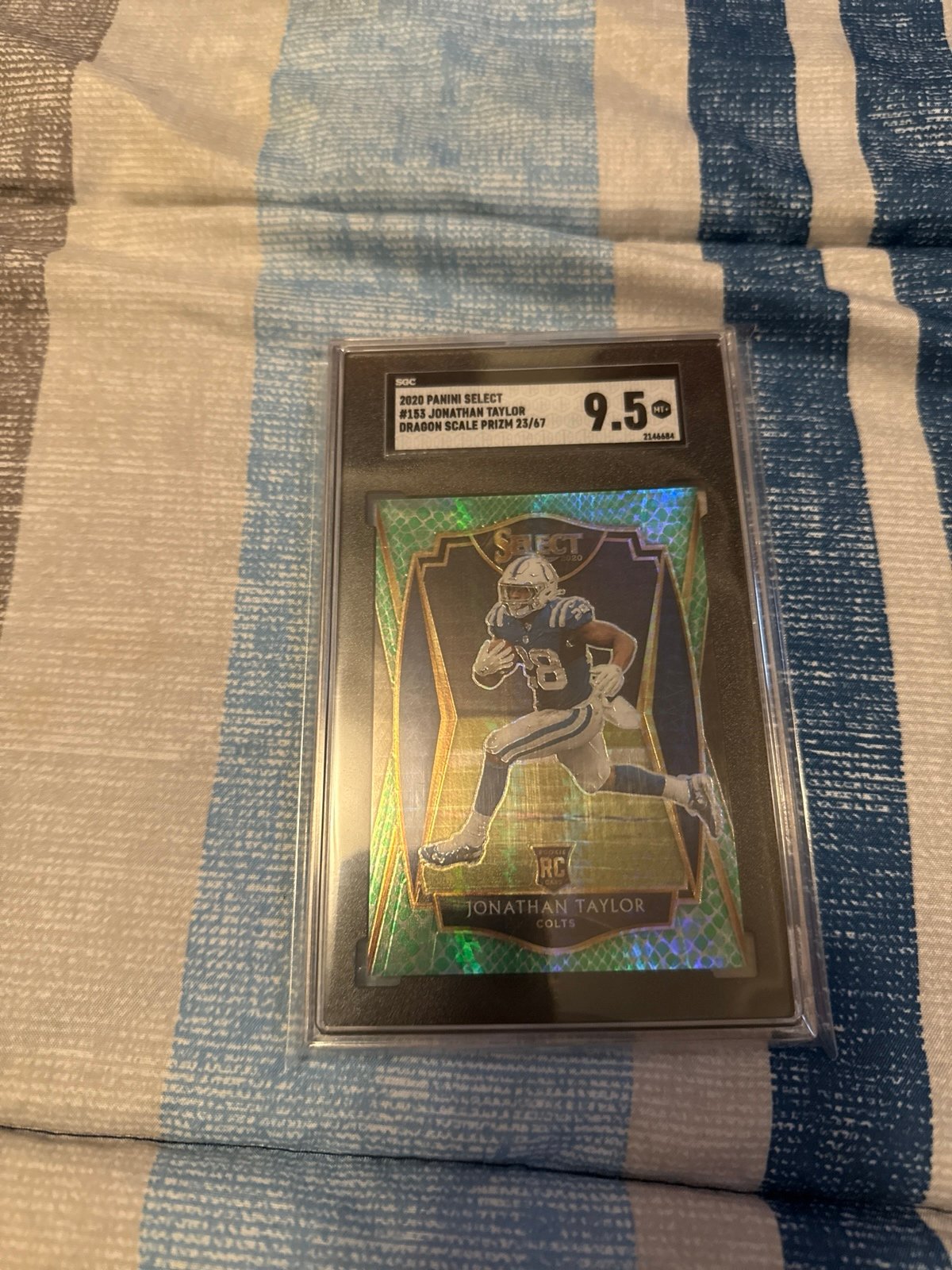 SGC 9.5 Jonathan Taylor, rookie dragon scale prism 23/67