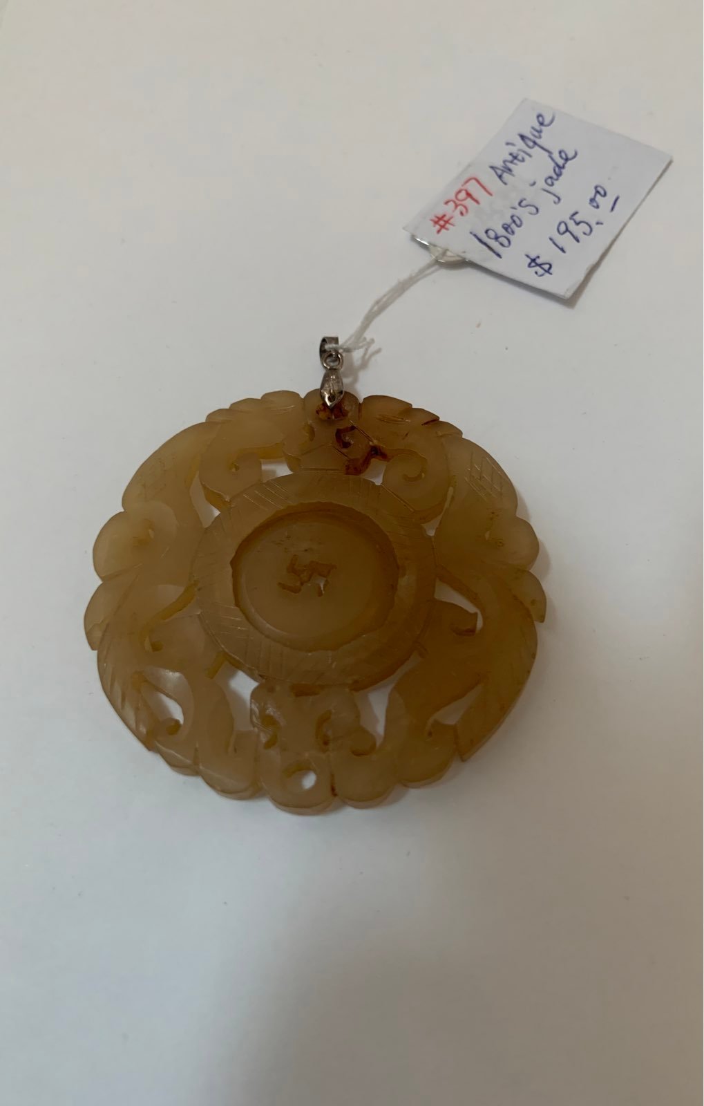 Antique jade pendant with silver buckle