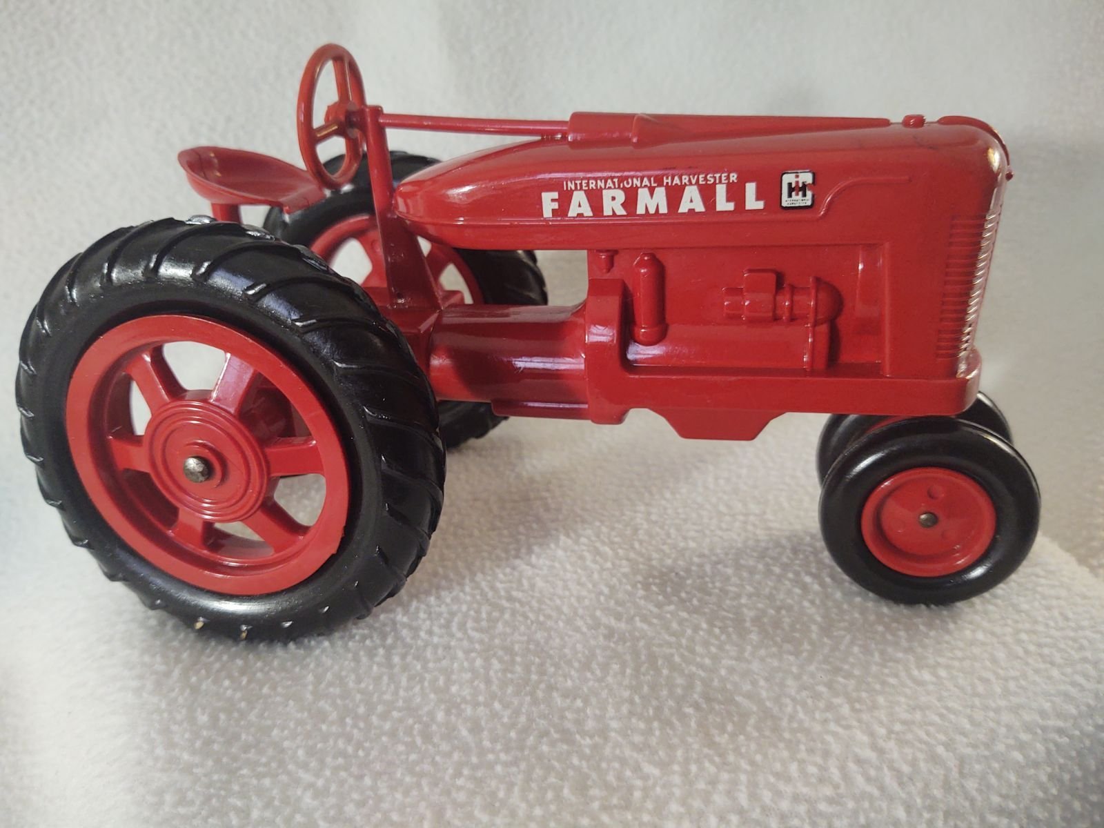 8 Vintage Farmall molded Plastic Tractor