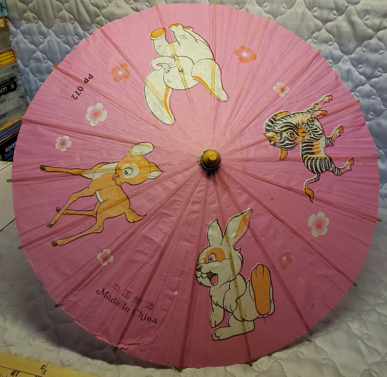 Add some charm to your collection with this vintage 17 round rice paper umbrell
