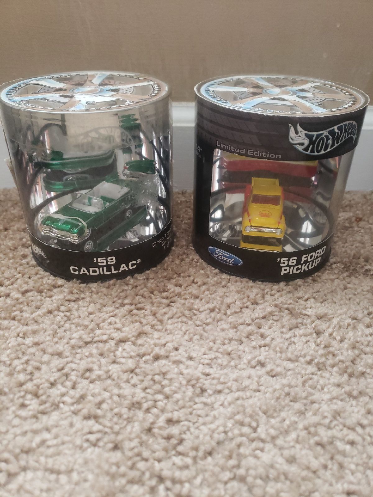 Two Hot Wheels one '56 Ford pickup anyway '59 Cadillac