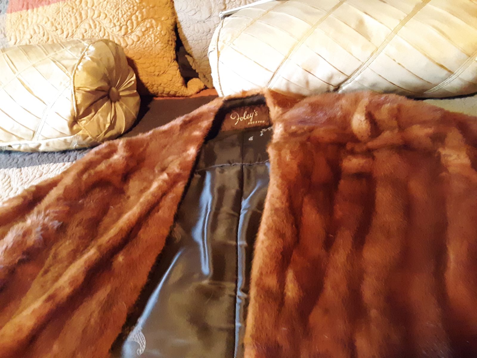 A real mink coat with matching hand warm