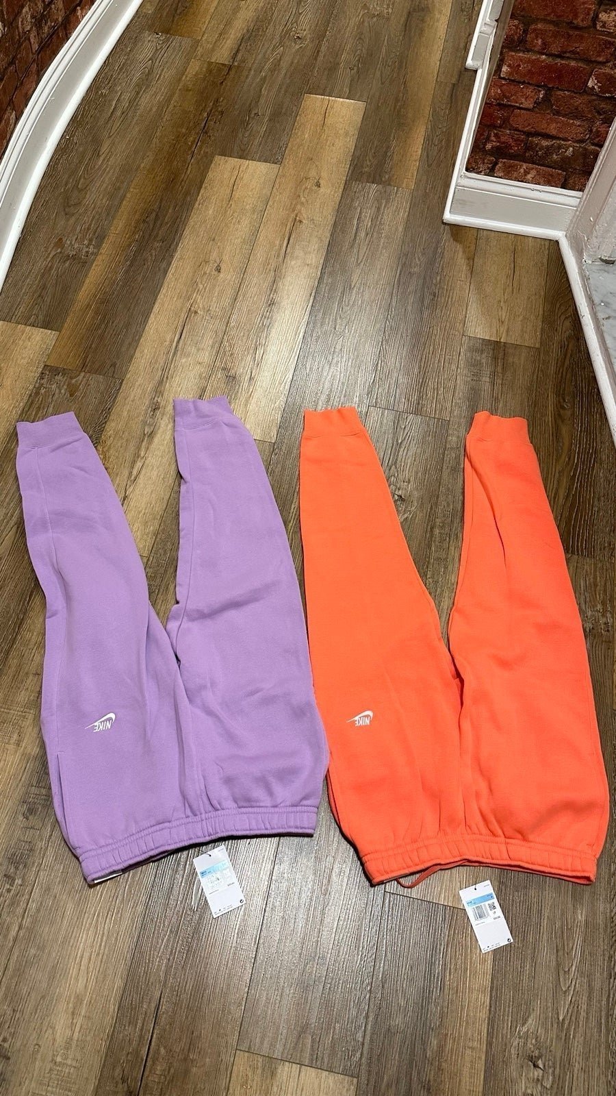Two standard fit tapered leg, regular length Nike Easter color, joggers NWT