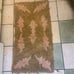 Antique hooked rug , Leaf pattern